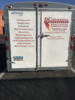 trail doors with DC Randall logo, phone number and list of services